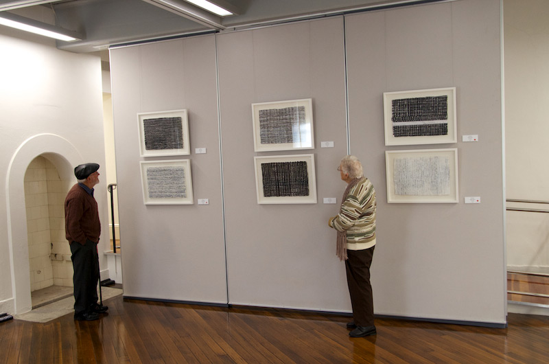 Muriel and Arthur with some of Ian's drawings